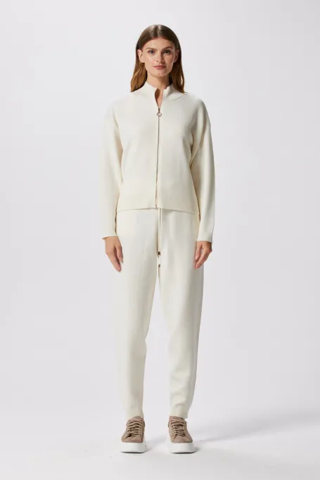 Krémové kalhoty z merino vlny