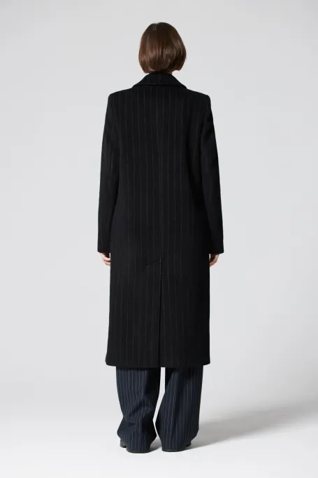 Vlněný kabát v tenis