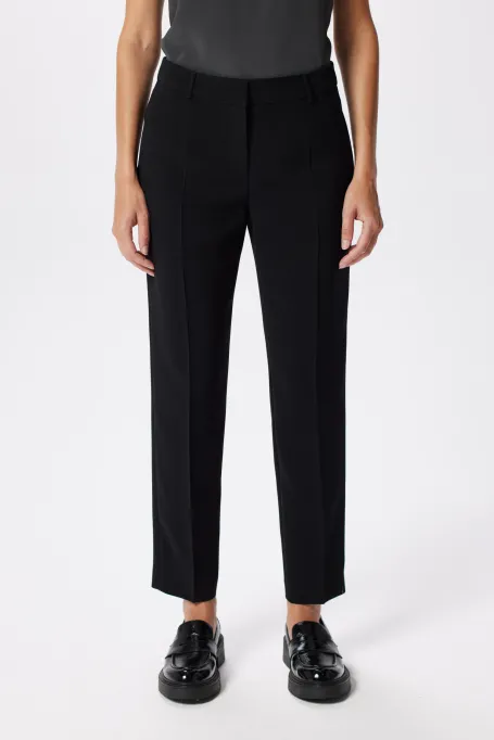 Elegantní černé kalhoty Lotto k obleku