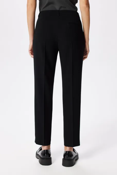 Elegantní černé kalhoty Lotto k obleku