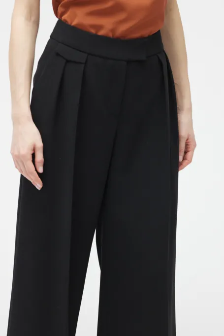 Černé široké kalhoty s manžetami