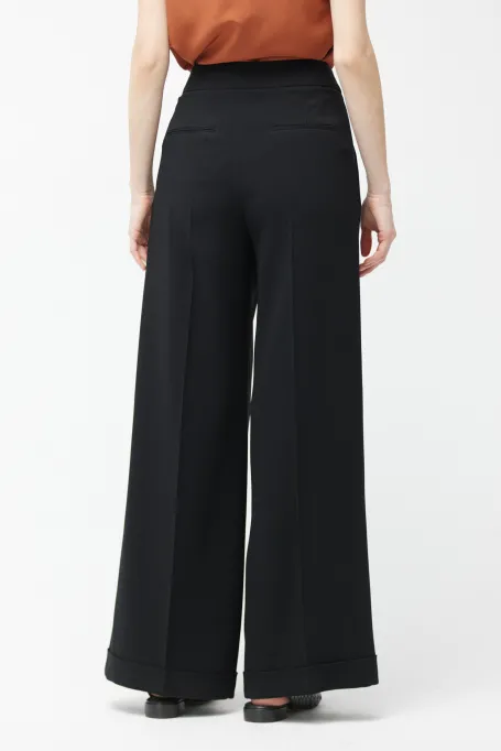 Černé široké kalhoty s manžetami