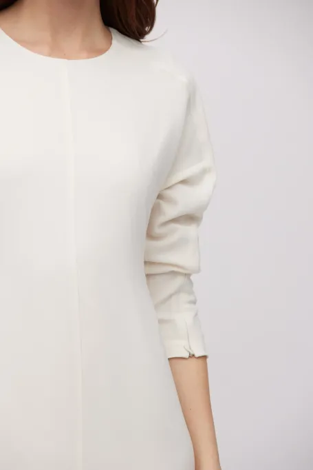 Bílá midi šaty s rozparkem