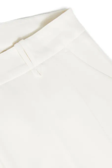 Bílé kalhoty Lotto k obleku