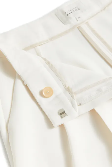 Bílé kalhoty Lotto k obleku