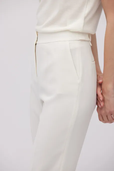 Bílé kalhoty Lotto k obleku