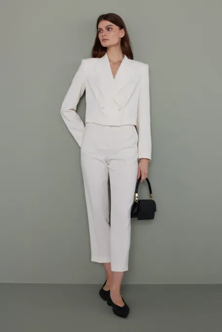 Bílé kalhoty Lotto k obleku