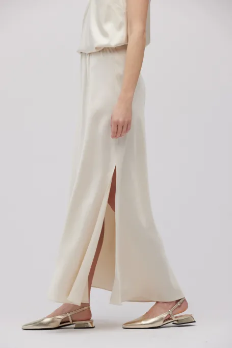 Dlouhá béžová sukně s rozparky