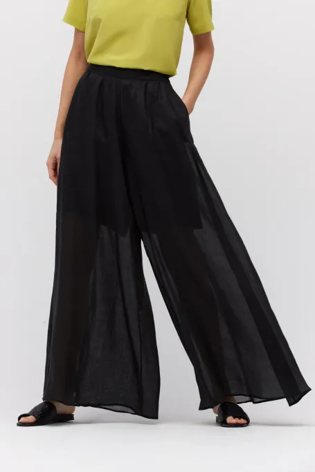 Černé široké kalhoty z ramie