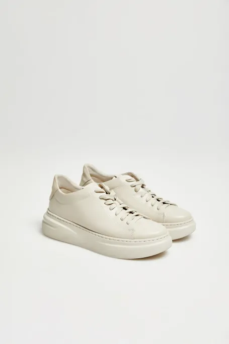 Béžové kožené sneakersy na platformě