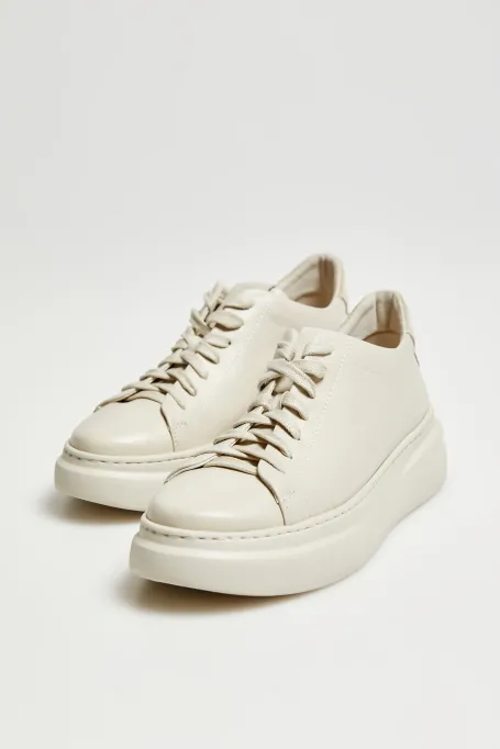 Béžové kožené sneakersy na platformě