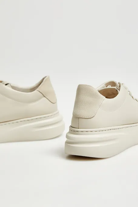 Béžové kožené sneakersy na platformě