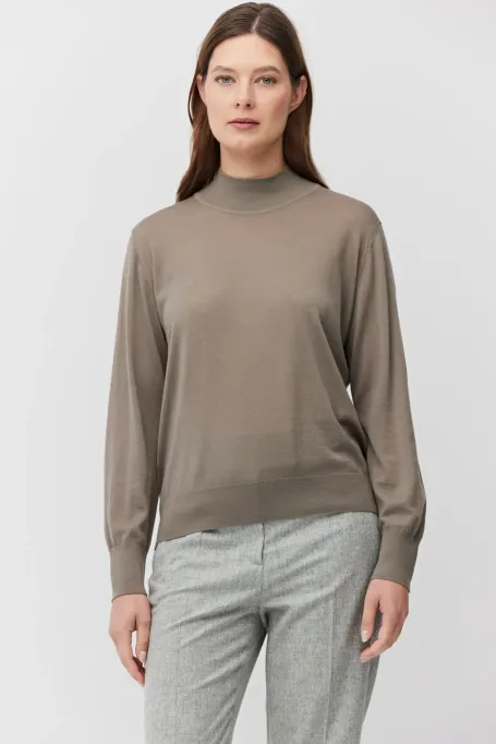 Beige polo-neck blouse made of merino wool