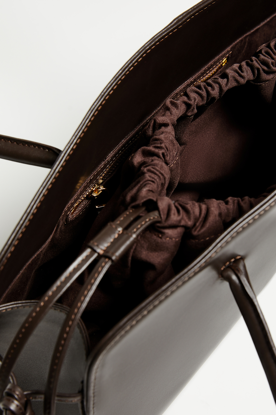 Čokoládově hnědá kožená kabelka se střapci - Patrizia Aryton Čokoládově hnědá kožená kabelka se střapci - Patrizia Aryton